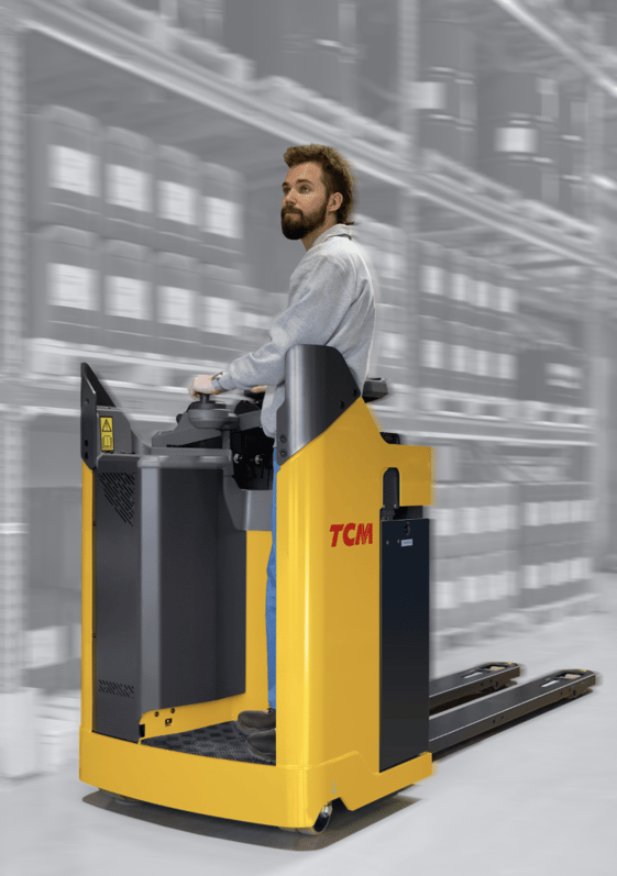 Operator riding a TCM electric-powered pallet truck