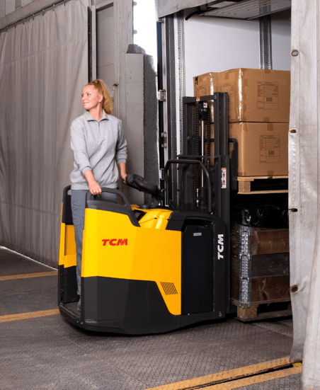 TCM's ride-on double pallet stacker person on the truck